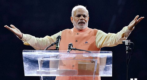Prime Minister Narendra Modi gestures while addressing the audience during a reception organised in his honour by the Indian American Community Foundation at Madison Square Garden in New York on Sunday | PTI