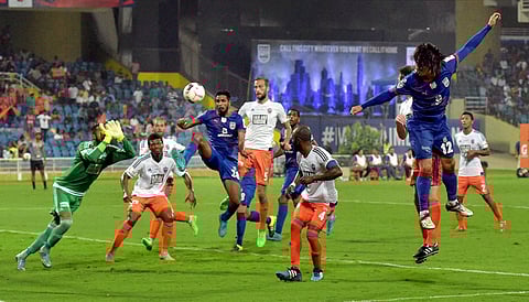 Mumbai City FC Blue and FC Pune City White players in action during the Indian Super League ISL match at DY Patil Stadium in Navi Mumbai on Friday.| PTI