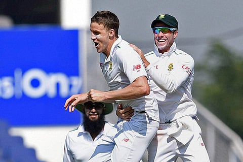 South African bowler M Morkel celebrates the wicket of Indian Captain Virat Kohli during the 3rd test match in Nagpur on Wednesday. | PTI