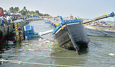 Crane Lowering Boat Crashes into Sea; 4 Hurt