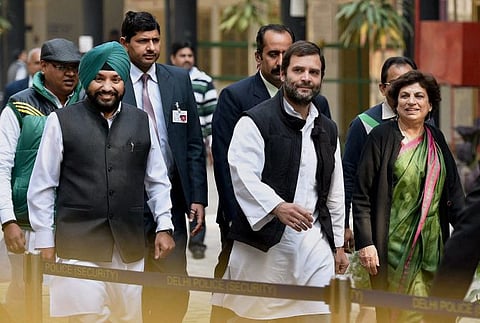 Congress Vice President Rahul Gandhi leaves after casting his vote for the Assembly elections, in New Delhi. (PTI Photo)