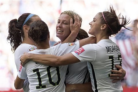 United States' Abby Wambach celebrates her goal with her teammates during the first half of a FIFA Women's World Cup soccer match against Nigeria. |AP