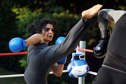 Indian Bollywood Actress Ritika Singh performs during the promotion of upcoming Hindi film 'Saala Khadoos' directed by Sudha Kongara, in Mumbai. |AFP