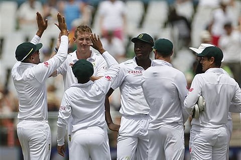 South Africa's players celebrate taking the wicket of England Joe Root during their second test cricket match in Cape Town, South Africa. |AP