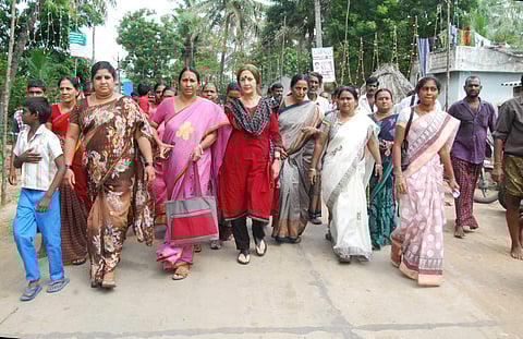 CPM politburo member Brinda Karat with residents of Kamsali Bethapudi village of West Godavari on Thursday | EPS