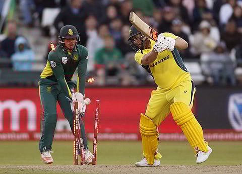 Australia’s Aaron Finch, right, loses his wicket during their 5th One Day International, against South Africa in Cape Town, South Africa. | AP