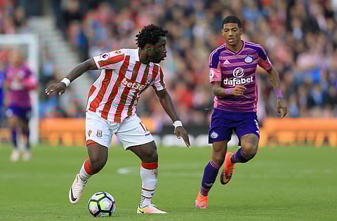 Stoke City's Wilfried Bony, left, and Sunderland's Patrick van Aanholt battle for the ball during the English Premier League soccer match at the Bet365 Stadium, Stoke, England. Saturday Oct 15. | AP