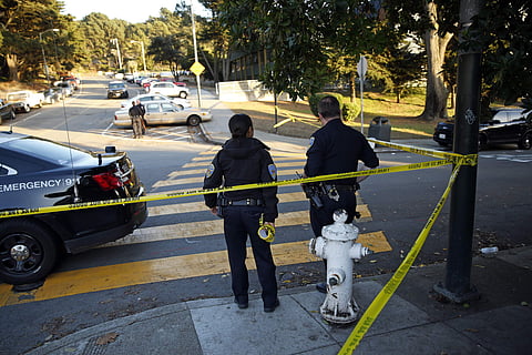 San Francisco Police stand at the site of a shooting outside the June Jordan School for Equity and City Arts and Technology High School | AP