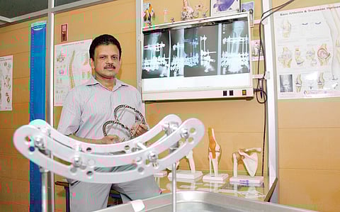 Dr Shibu John Varkey; a patient (below)