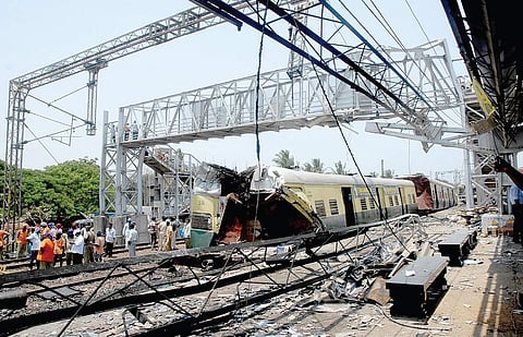 Damaged bogies of the suburban train after it collided with a goods train near the Vyasarpadi Jiva Railway Station on April 29, 2009