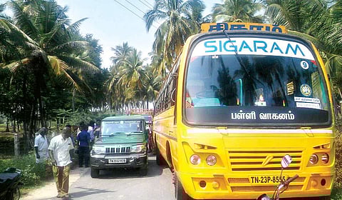 The school bus, under which V Dinesh (inset) was crushed to death on Monday | Express