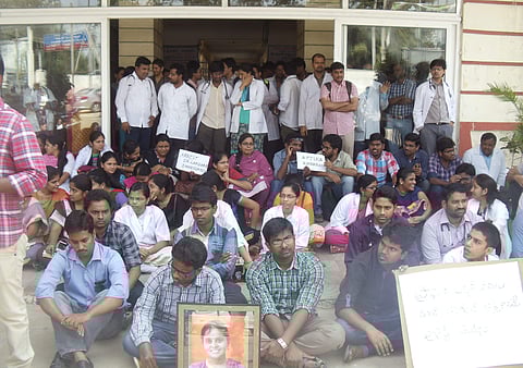 Students staging a protest in front of superintendent’s office at Guntur Medical College on Wednesday demanding suspension of Professor AVV Lakshmi | EXpress Photo Service