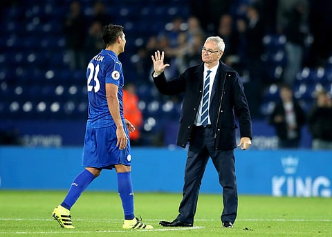 Leicester City manager Claudio Ranieri, right, with Leicester City's Leonardo Ulloa after the final whistle of their English League Cup(Photo|AP)