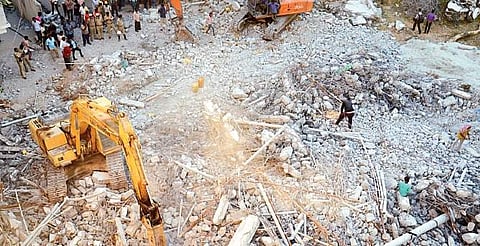 Rescue and NDRF personnel clear the debris at the site where the building collapsed in Bellandur on Wednesday | pushkar v