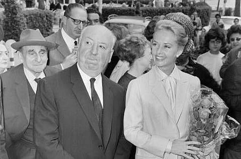 In this May 9, 1963 file photo, director Alfred Hitchcock and American actress Tippi Hedren arrive at the Carlton Hotel in Cannes, France for the presentation of their film 'The Birds'. | AP