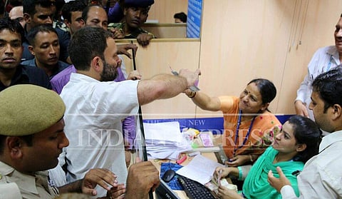 Congress vice-president Rahul Gandhi gets his currency exchanged at an SBI branch in New Delhi on Friday (Photo | Shekhar Yadav)