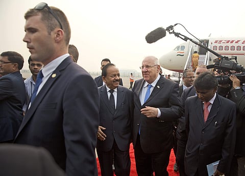Israeli President Reuven Rivlin, center right, talks with India's Science and Technology Minister Harsh Vardhan, center left, upon his arrival at the Palm airport in New Delhi, India, Monday. | AP