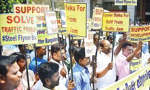 People from various residents’ associations and other forums protest in support of the steel flyover on Saturday | Pushkar V