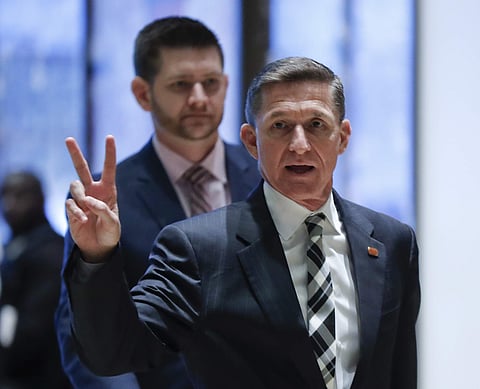 Retired Lt. Gen Michael Flynn gestures as he arrives at Trump Tower, Thursday, Nov. 17, 2016, in New York. (AP Photo)