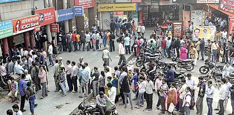Serpentine queues for cash outside ATMs after demonetisation