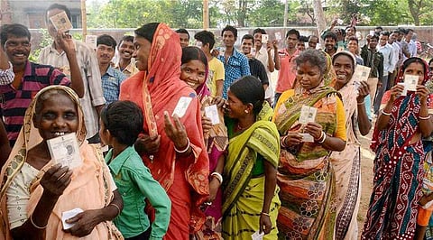 A file photo of people standing in Que to vote in West Bengal | PTI