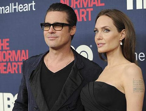 A 2014 file image of Brad Pitt and Angelina Jolie at the premiere of 'The Normal Heart' in New York. (Photo | AP)