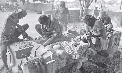Stone artists making traditional sculptures at Allagadda town to be erected at Yadadri temple | Express photo