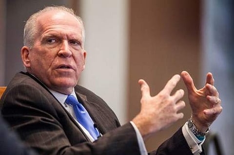 CIA Director John Brennan speaks during a panel discussion moderated by National Security Division Deputy Assistant Attorney General Stuart J. Evans. | AFP