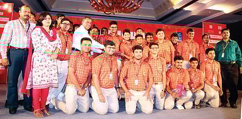 Quizmaster Soumyadip Chowdhury along with the prize winner Sai International School at 5th Odisha Literary Festival 2016 in Bhubaneswar on Sunday | Express