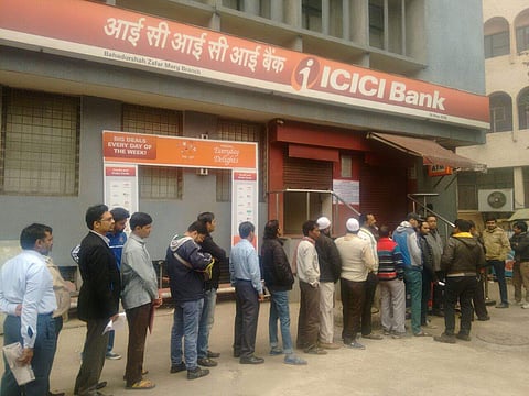 With most ATMs still remaining dry, the overall scenario looks grim and might continue to be so for the next few days. Here people are waiting before an ICICI ATM in New Delhi. (Shekhar Yadav | EPS)