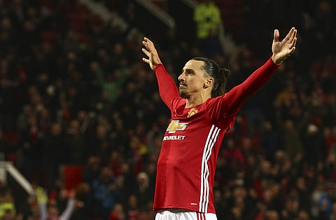 Manchester United's Zlatan Ibrahimovic celebrates after scoring his sides 4th goal and his second of the game during the English League Cup quarterfinal. | AP