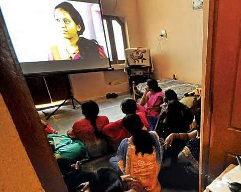Sex workers watch documentary on human trafficking at Hasanparthy on Wednesday | sayantan ghosh
