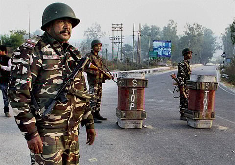 Security personnel stand guard in Jammu on Wednesday during search operations following the militant attack on the Nagrota Army camp | PTI