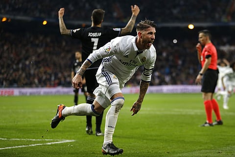 Real Madrid's Sergio Ramos celebrates after scoring the the winning goal against Deportivo during a Spanish La Liga soccer match between Real Madrid and Deportivo Coruna. | AP