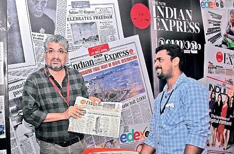 Film director Shyamaprasad visiting the stall of ‘The New Indian Express’ on Tagore Theatre premises on Saturday