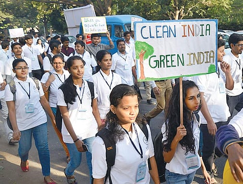Students take part in walkathon to create awareness on demonetisation and Swachh Bharat in Bengaluru on Sunday | pushkar v