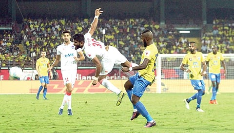 Delhi Dynamos’ Anas Edathodika (L) and Kerala Blasters’ Duckens Nazon vying for the ball during their ISL semifinal clash in Kochi on Sunday | Melton Antony