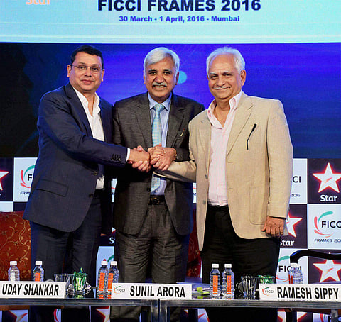 Sunil Arora (center) with Uday Shankar, CEO STAR India (left), and veteran film maker Ramesh Sippy at FICCI Frames 2016 in Mumbai. (File Photo | PTI)