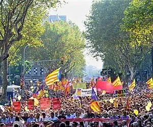 (File Photo | AP) People take part in a Catalonian separatist demonstration during celebrations marking Catalonian National Day in Barcelona.