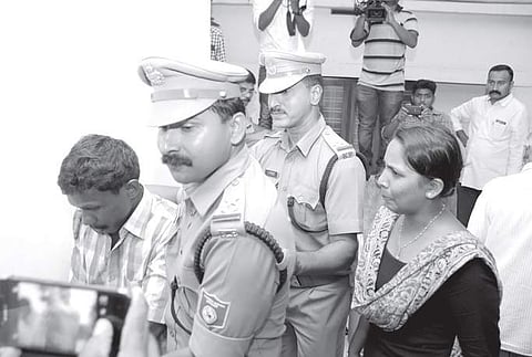 Police take the murder accused to the area where the investigation is on