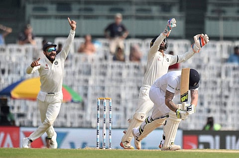 India's captain Virat Kohli and Parthiv Patel celebrate the dismissal of England's Ben Stokes during second day of the fifth cricket test match at MAC Stadium in Chennai on Saturday. | PTI