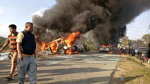 Angry people set on fire vehicles in Imphal East district on Sunday in protest against the United Naga Council’s indefinite economic blockade | Express