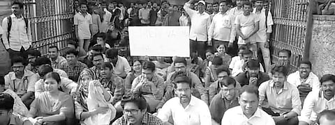 Doctors and medicos staging a dharna at the government hospital in Kakinada on Saturday condemning the ‘highhanded’ behaviour of MLA SVSN Varma | Express