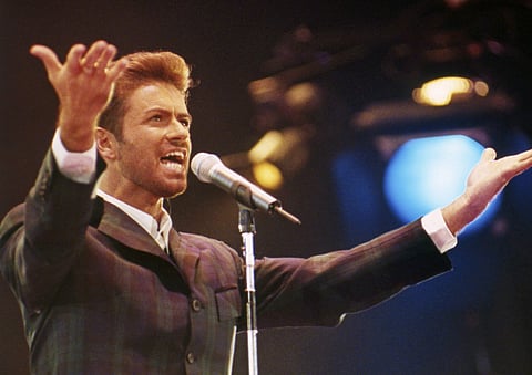 In this Dec. 2, 1993 file photo, George Michael performs at 'Concert of Hope' to mark World AIDS Day at London's Wembley Arena. | AP