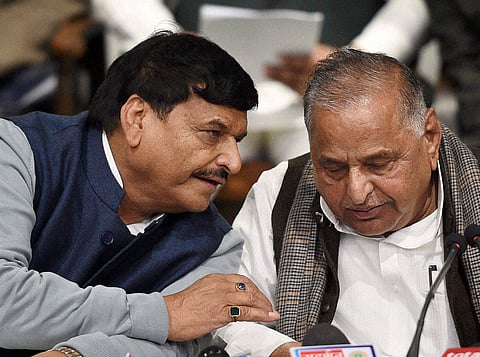 Samajwadi Party supremo Mulayam Singh Yadav with party’s UP president Shivpal Yadav at a press conference at the party office in Lucknow on Wednesday | PTI