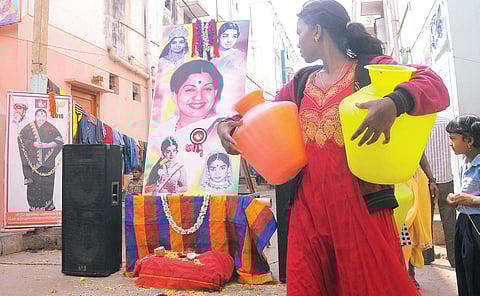 Posters and banners of Jayalalithaa were put up in Pantharapalya, Bengaluru, on Tuesday, following her death on Monday | vinod kumar t