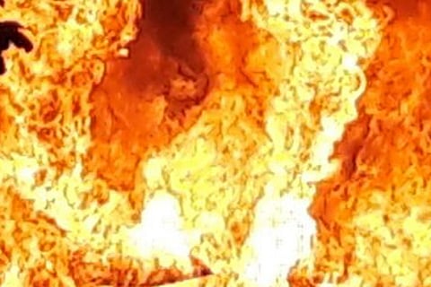 Situation became sensitive after a foreign national in his car mowed down a 35 year old woman in Hesaraghatta in Bengaluru on Sunday. The angry mob put fire to the car later. | EPS