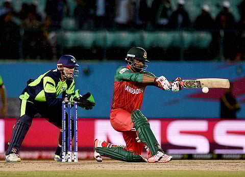 Bangladesh batsman Tamim Iqbal Khan plays a shot against Ireland during the T20 world cup match in Dharamshala. | PTI
