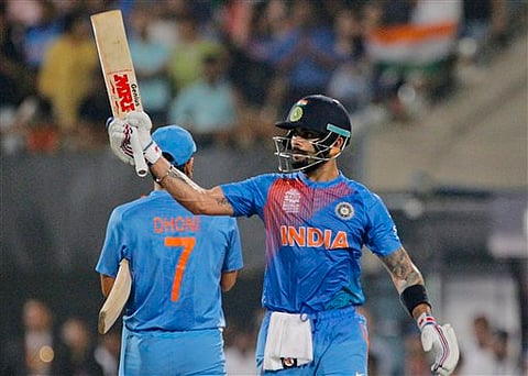 India's Virat Kohli celebrates his fifty runs during the ICC World Twenty20 2016 cricket match against Pakistan at Eden Gardens in Kolkata. |AP