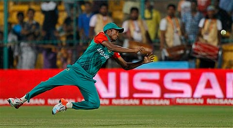 Bangladesh’s Al-Amin Hossain drops a catch of Australia's John Hastings during their ICC World Twenty20 2016 cricket match in Bangalore. |AP